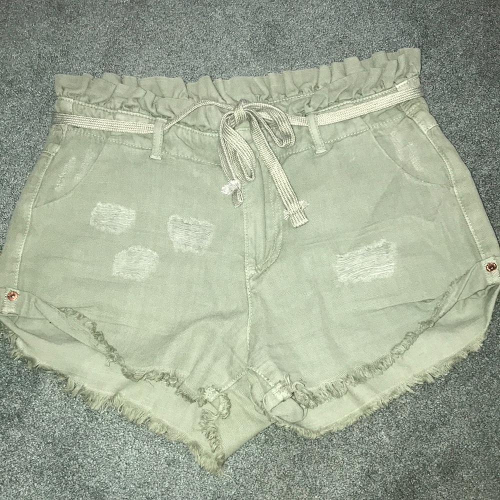 Green jean shorts